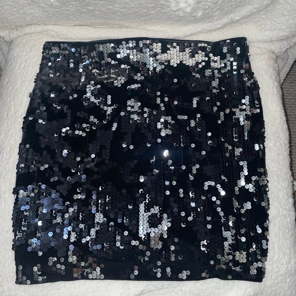 From express, never warn. New w/tags  sequin skirt. fleece lining mini skirt